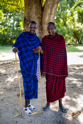 Portrait of two of the Maasai at TICC wearing their traditional attire